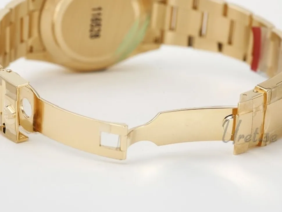 Daytona Svart/18 karat gult guld Ø40 mm