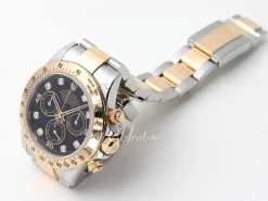 Daytona Svart/18 karat gult guld Ø40 mm